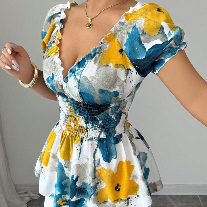 Chemisier femme décolleté plongeant imprimé floral coupe péplum - Yelina