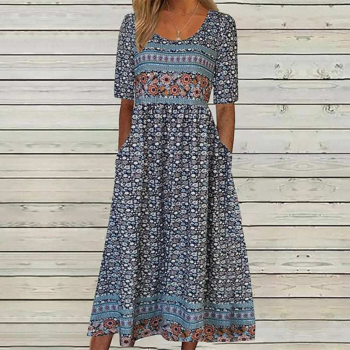 Robe midi jeune avec col rond et poche latérale