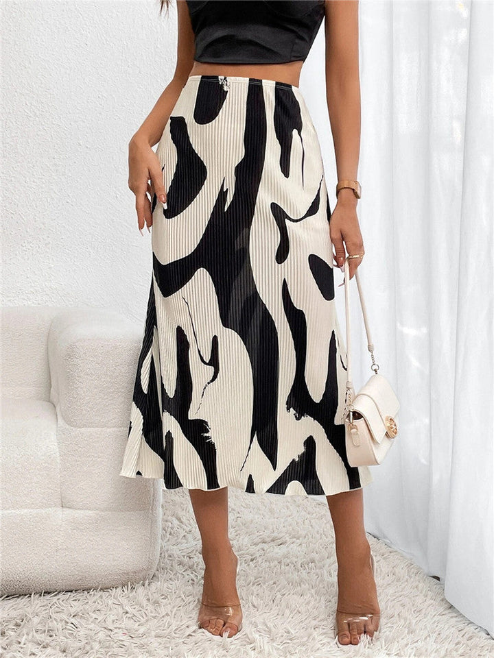 Jupe élégante aux plis fluides, parfaite pour un look raffiné et féminin en toute occasion.