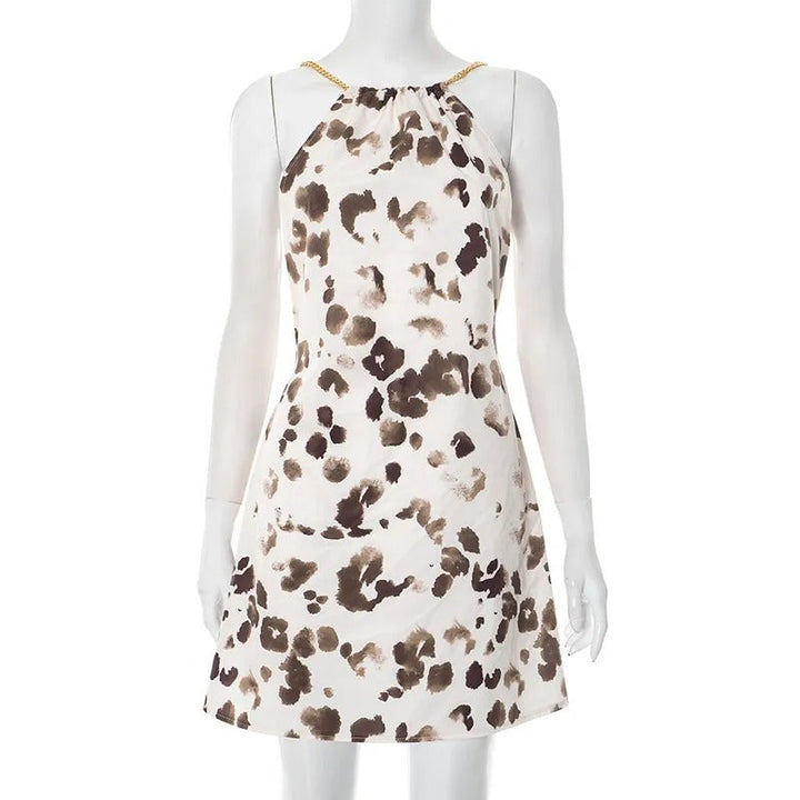 Robe courte avec décolleté dos nu et bretelles en chaîne - Camila
