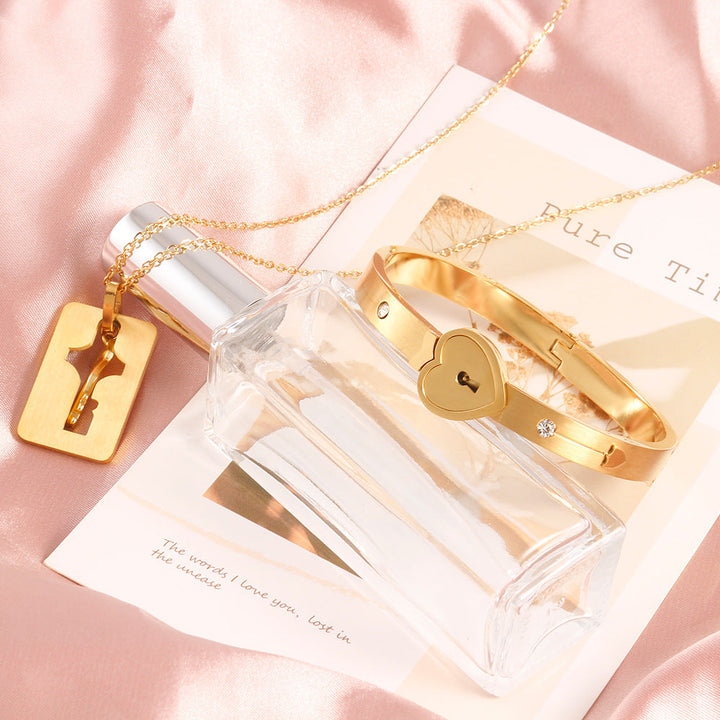 Parure couple cadenas et clé design cœur - Énclave