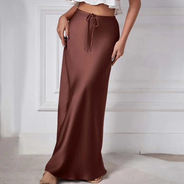Jupe taille haute en satin avec liens, élégante et tendance, parfaite pour un look sophistiqué et moderne