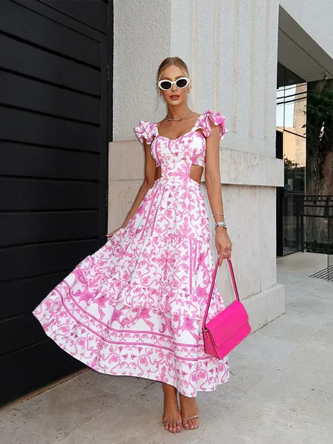 Sally - Longue robe rose à imprimé floral