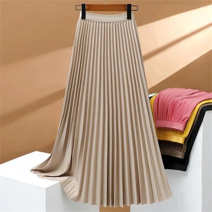 Jupe longue plissée extensible à taille haute, élégante et confortable, parfaite pour un look sophistiqué et féminin.