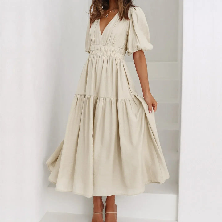 Kelly - Robe élégante avec décolleté en V et manches bouffantes