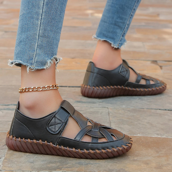 Chaussures plates de style mocassin ajouré en cuir blanc pour femme - Anelya