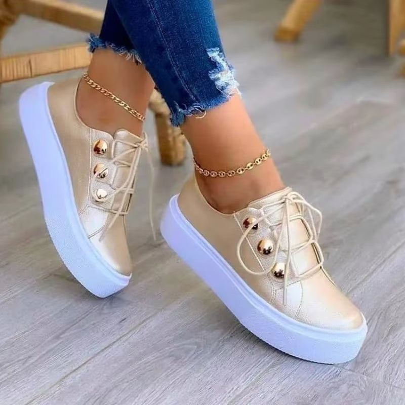 Baskets compensées pour femmes avec finition brillante et détails métalliques - Alma