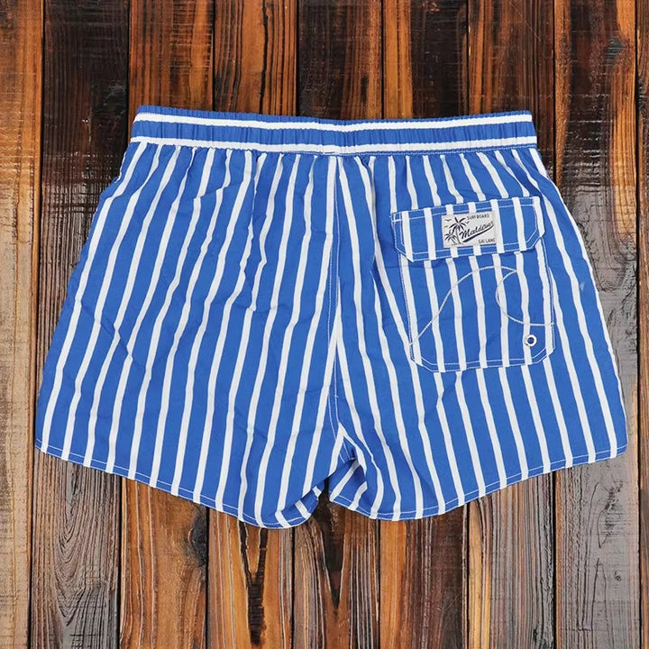 Maillot de bain homme court à rayures verticales bleu et blanc - Oceanix