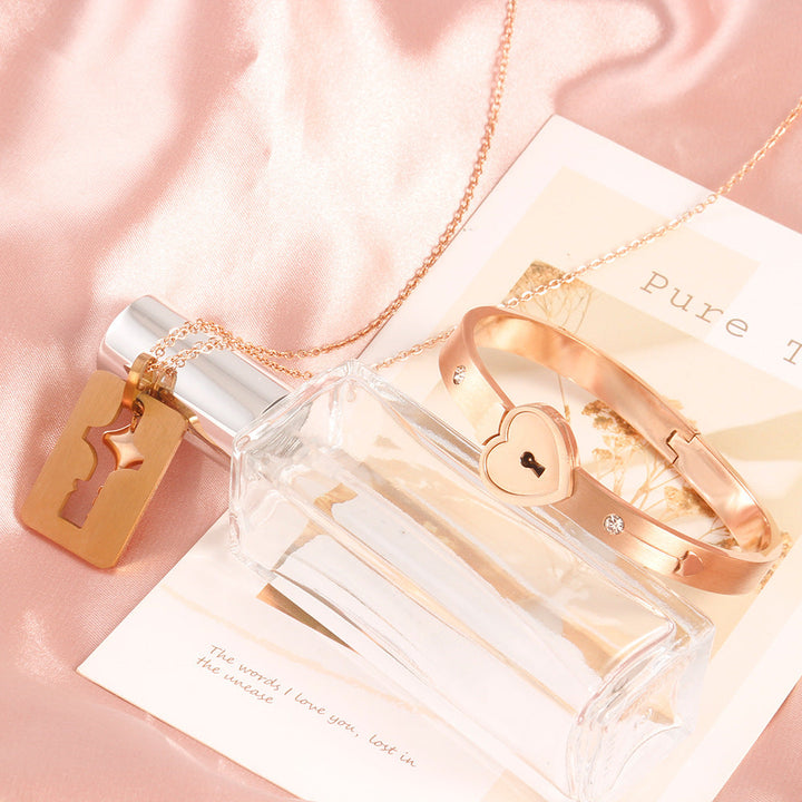 Parure couple cadenas et clé design cœur - Énclave