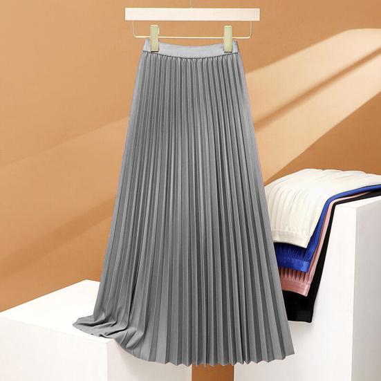 Jupe longue plissée extensible à taille haute, élégante et confortable, parfaite pour un look sophistiqué et féminin.