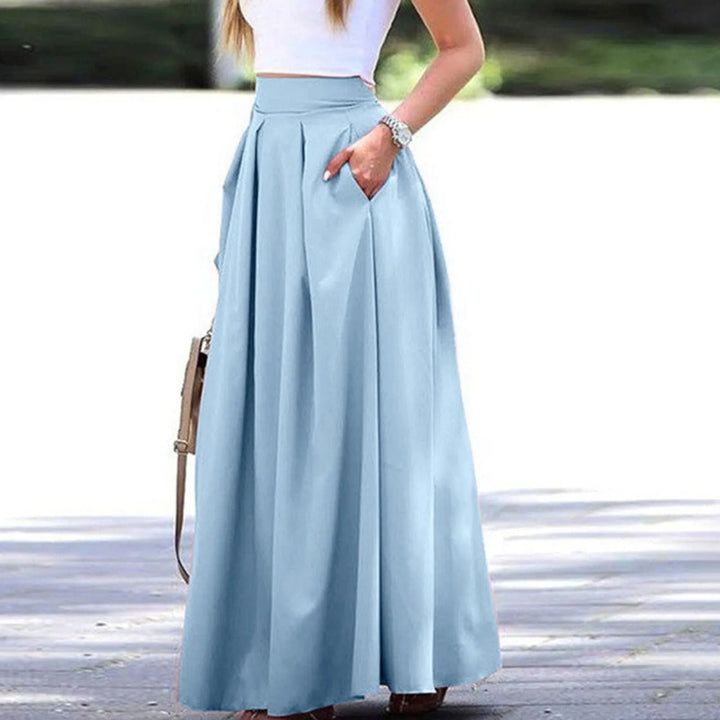 Jupe plissée à taille haute, élégante et fluide, idéale pour un look sophistiqué et féminin