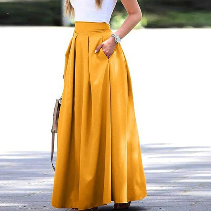 Jupe plissée à taille haute, élégante et fluide, idéale pour un look sophistiqué et féminin